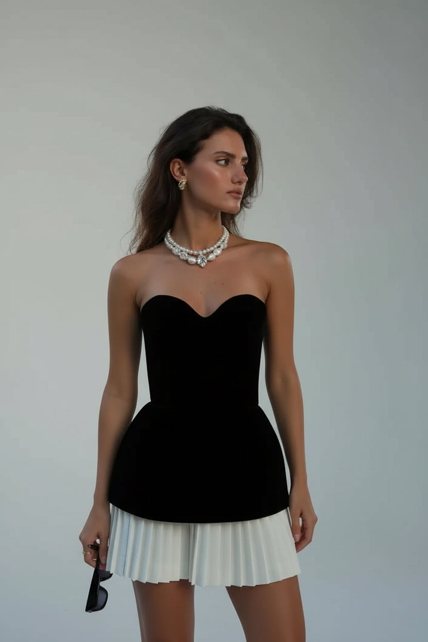 Ensemble femme bustier noir jupe plissée blanche soirée