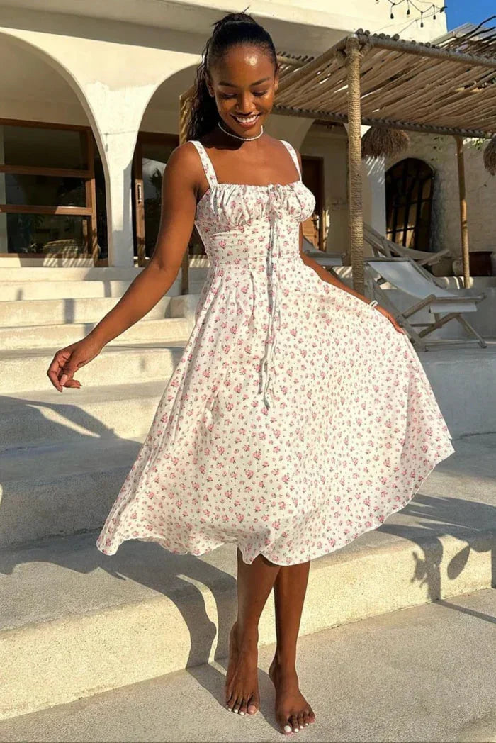 Robe midi blanche à fleurs avec bretelles corset | ROBEMODE