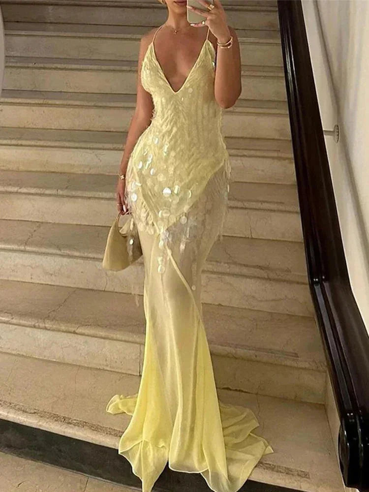 Robe longue jaune à sequins dos croisé col V