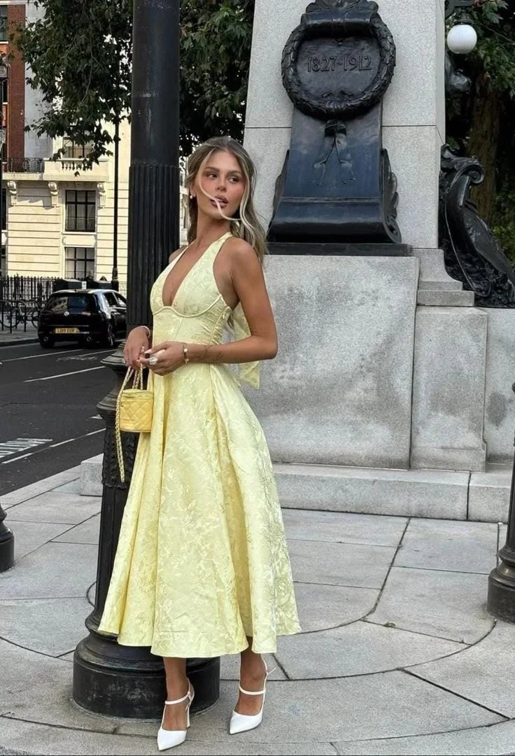 Robe midi femme jaune dos nu avec jupe plissée