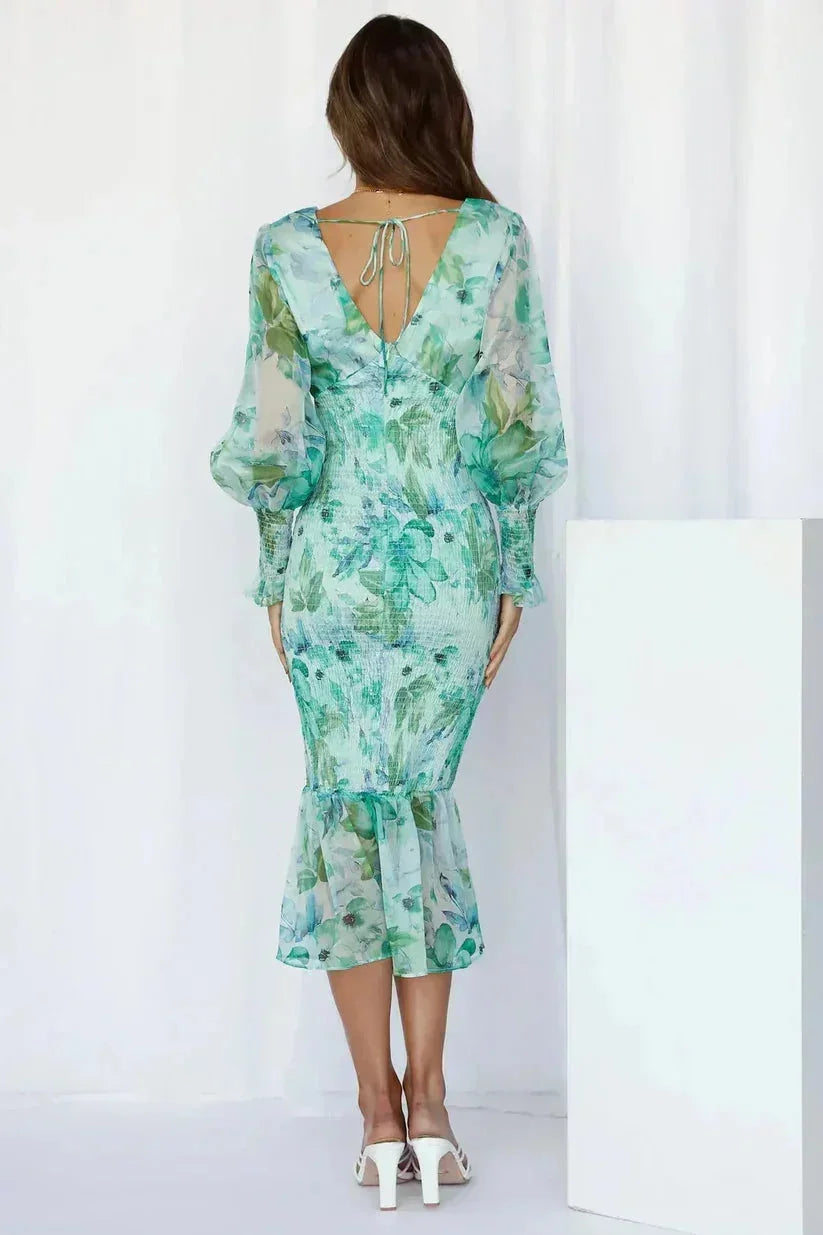 Robe midi fleurie manches longues col V évasée | ROBEMODE